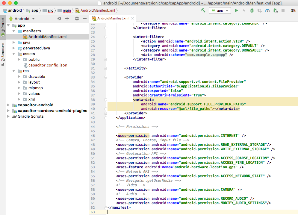 Android Studio editor showing the AndroidManifest.xml file with camera permissions.